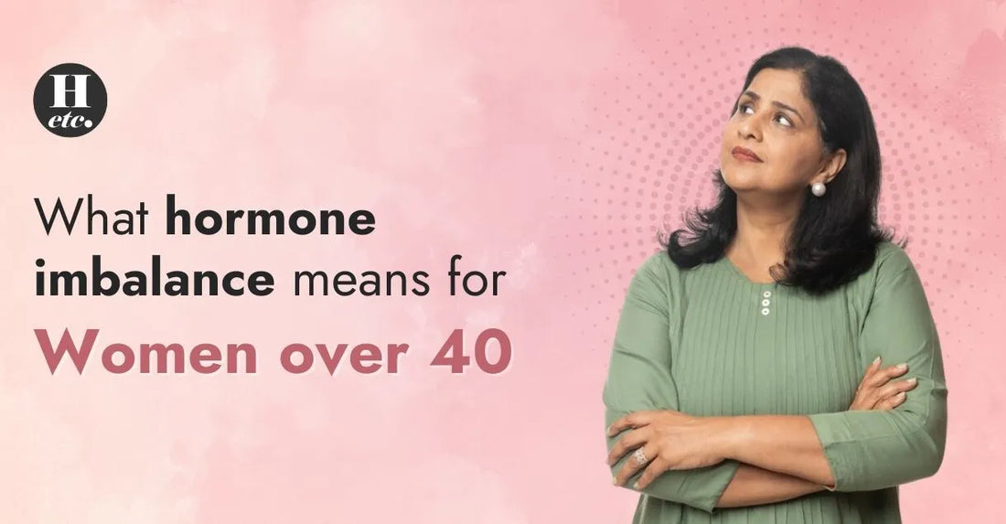 Thoughtful middle-aged woman in green top, representing hormone imbalance concerns for women over 40 on pink background